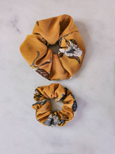 Load image into Gallery viewer, jumbo and regular sized mustard colored scrunchies with floral print
